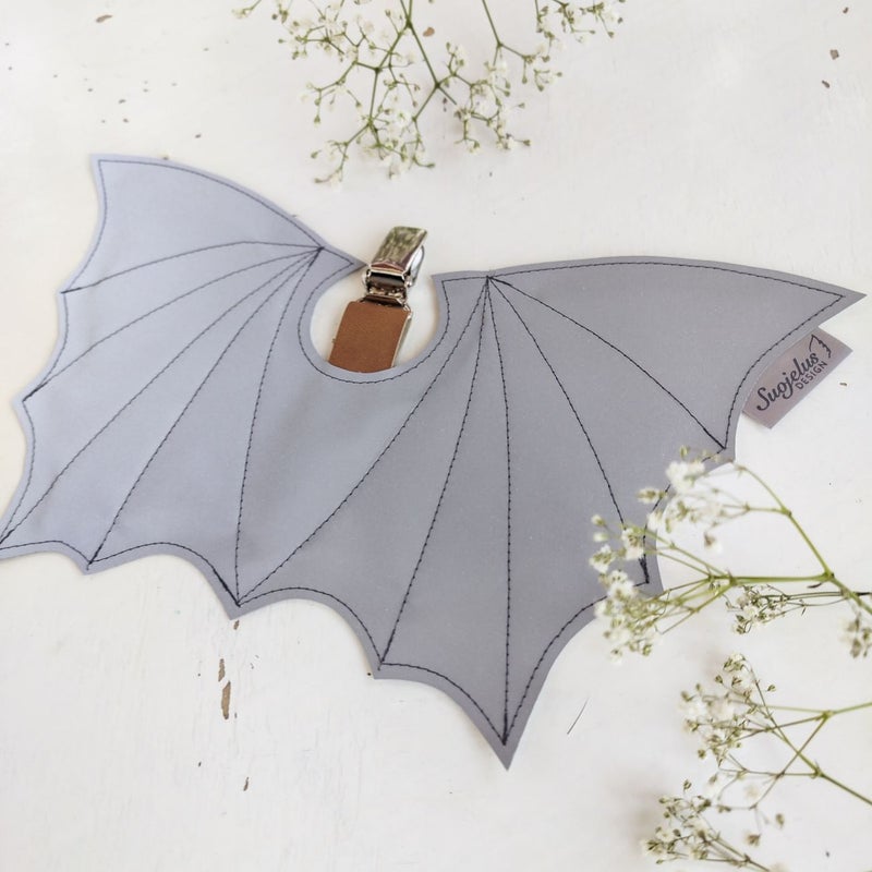 Suojelus Design - Heijastinsiivet, Lohik&auml;&auml;rme